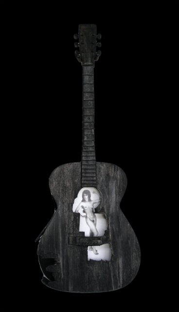 Beauty and a Broken Song V.JPG - “Beauty and a Broken Song VI”   15 x 40 x 4”    Mixed Media on Burnt Guitar, Photograph   Photograph Developed by Jennifer Hart Biagiotti 2008  