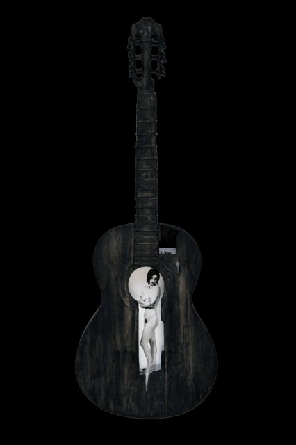 Beauty and a Broken Song X.jpg - “Beauty and a Broken Song X”   15 x 39 x 4”    Mixed Media on Burnt Guitar, Photograph   Photograph Developed by Jennifer Hart Biagiotti 2008  